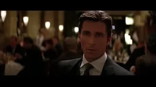 man in suit looking in restaurant — Batman: The Dark Knight