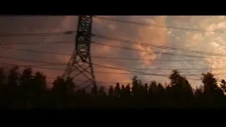 power line tower silhouetted against sunset — Spiderman: No Way Home