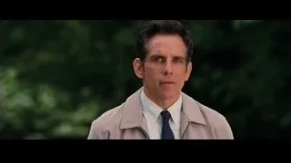 Man in trench coat with serious expression in park — The Secret Life of Walter Mitty