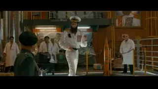 Two men in military uniforms conversing — The Dictator