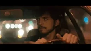 Man driving car at night in city — Jobs