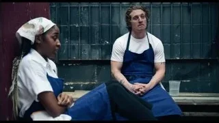 man and woman in chef's attire talking — The Bear