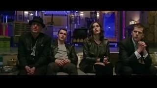 four people sitting on couch in nightclub — Now You See Me 2