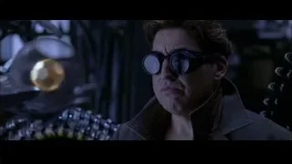 Man with sunglasses in dimly lit room — Spider Man 2