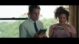 man and woman looking at tablet — The Secret Life of Walter Mitty