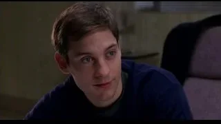 young man sitting in office chair — Spider Man