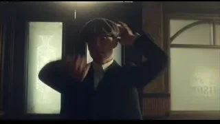 man adjusting hat in ornate room — Peaky Blinders