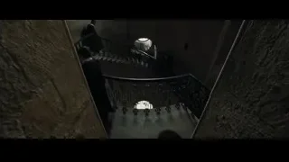 Person walking up dark spiral staircase — Harry Potter and the Goblet of Fire