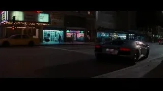 Sports car on street at night — Batman: The Dark Knight Rises