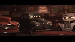 three Cars characters in dimly lit garage — Cars 3