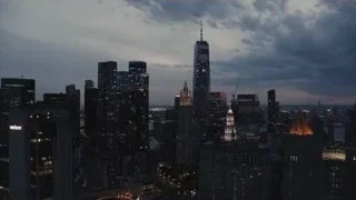 Panoramic city skyline at dusk — Succession