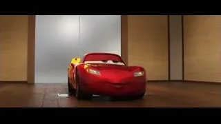 red car on stand in room — Cars 3