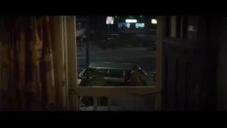night view of green car from window — Ford v Ferrari