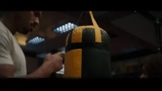 person in gym with punching bag — Creed 3