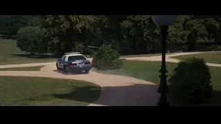 police car driving on park road — Batman: The Dark Knight Rises