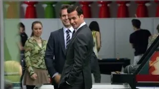 men in room with pool table — Suits
