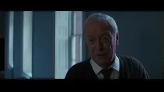 Elderly man in dimly lit room — Batman: The Dark Knight Rises
