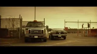 truck driving on dirt road — John Wick
