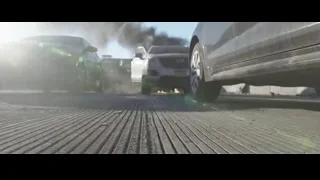 car on road with smoke and flames — Spiderman: No Way Home