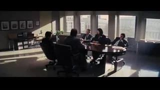 Group of people at office conference table — The Wolf Of Wall Street