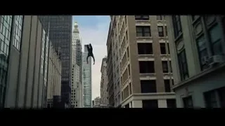blue tow truck driving on city street — The Amazing Spider Man 2
