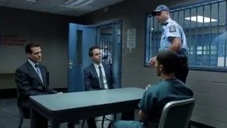 men in suits talking at table — Suits