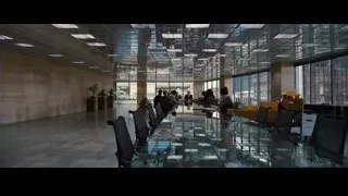 people in conference room with city view — Batman: The Dark Knight Rises