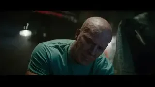 Bald man with serious expression in dark room — Deadpool 2