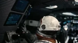 man in space suit in spaceship cockpit — Interstellar