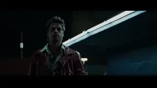 man in red leather jacket in dim room — Fight Club