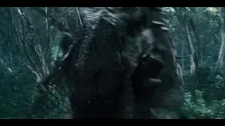 large dinosaur in jungle environment — Jurassic World