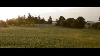 Cemetery with winding path at sunset — Superman: Man of Steel