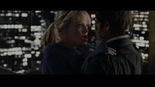 couple embracing in city at night — The Amazing Spider Man