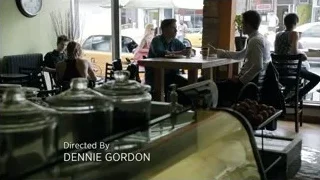 people conversing in restaurant — Suits
