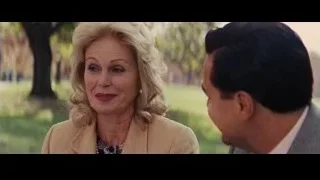 Man and woman conversing in park — The Wolf Of Wall Street