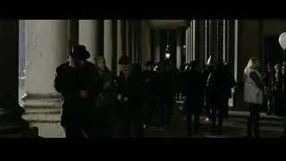 man in top hat talking on phone in corridor — Now You See Me 2