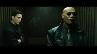two men in suit and leather jacket with sunglasses — The Matrix