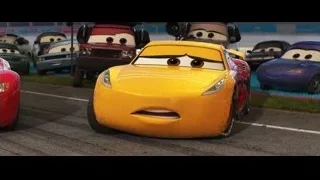 Yellow car driving on race track — Cars 3