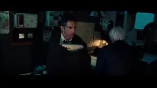 man at desk in dark room with equipment — The Secret Life of Walter Mitty
