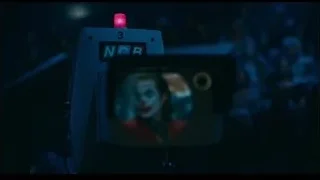 Television screen displaying Joker's face — Joker