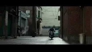 Young man riding motorcycle on narrow street — Bruce Lee: Birth of The Dragon
