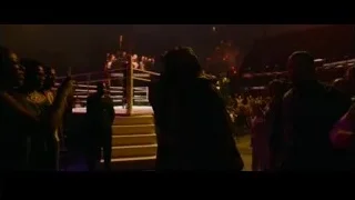 boxing ring with crowd at night — Creed 3