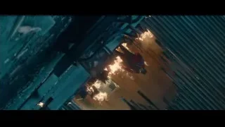 Man standing in front of large fire — Deadpool 2
