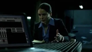 woman at desk looking at computer — Breaking Bad