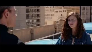young woman by blue car looking at man — Steve Jobs
