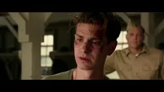 Young man with bruise in green t-shirt — Hacksaw Ridge