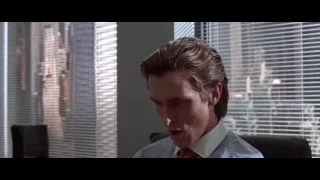 Man thinking in office chair by window — American Psycho