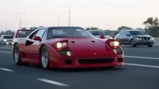 red sports car driving on highway — Sports Cars
