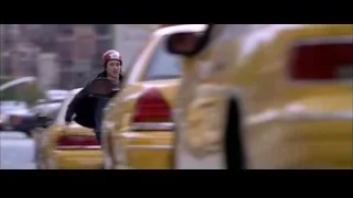man walking on busy city street — Spider Man 2