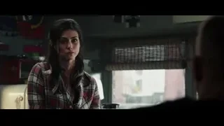 young woman deep in thought by window — Deadpool
